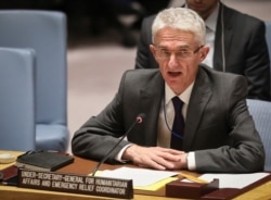 FILE - Mark Lowcock, the U.N. humanitarian affairs emergency and relief coordinator, addresses the Security Council with a report on Yemen, Oct. 23, 2018, at U.N. headquarters.