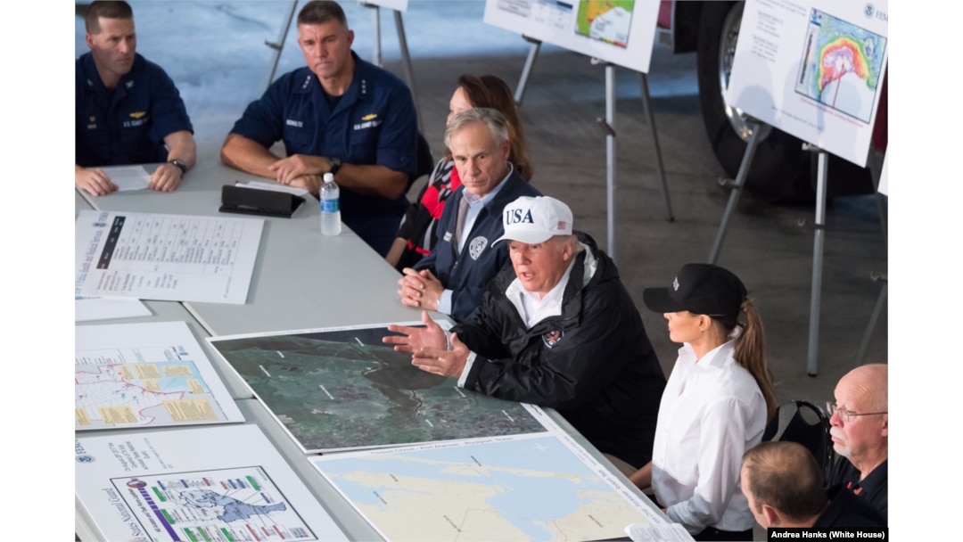 President Donald J. Trump and First Lady Melania Trump, joined by Texas Governor Greg Abbott, FEMA Administrator William “Brock” Long and representatives of the Red Cross, U.S. Coast Guard, local law enforcement and utility company officials, attend a briefing on Hurricane Harvey relief and rescue efforts, Tuesday, August 29, 2017, in Corpus Christi, Texas.