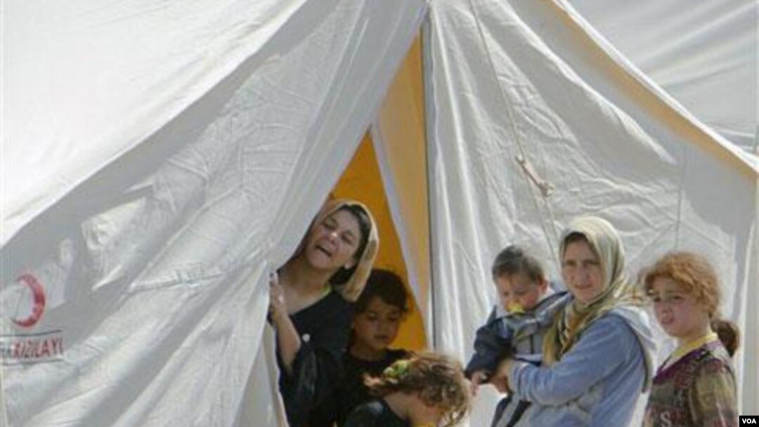 Refugiados sirios ubicados en un campamento, en Boynuyogun, Turquía.