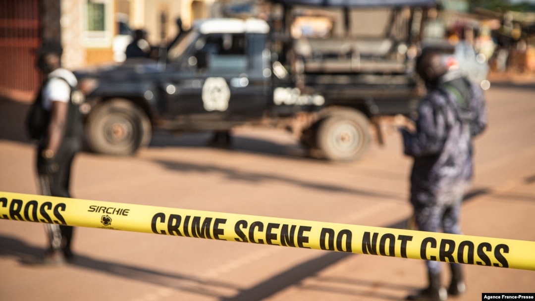 A crime scene following a bomblast last night is secured by the Ugandan police in Kampala, Oct. 24, 2021. 