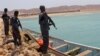 FILE - Somali Puntland forces are seen on the shores of the Gulf of Aden, in Bosaso, Puntland region, Somalia, Sept. 23, 2017.