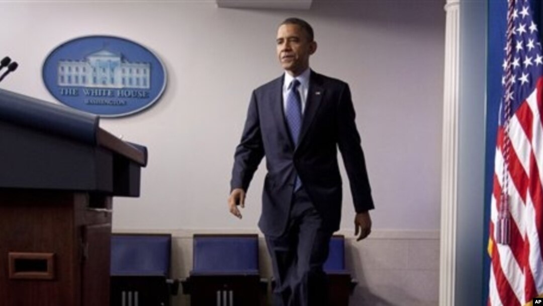 President Barack Obama approaches podium to discuss about the economy, White House, June 8, 2012.