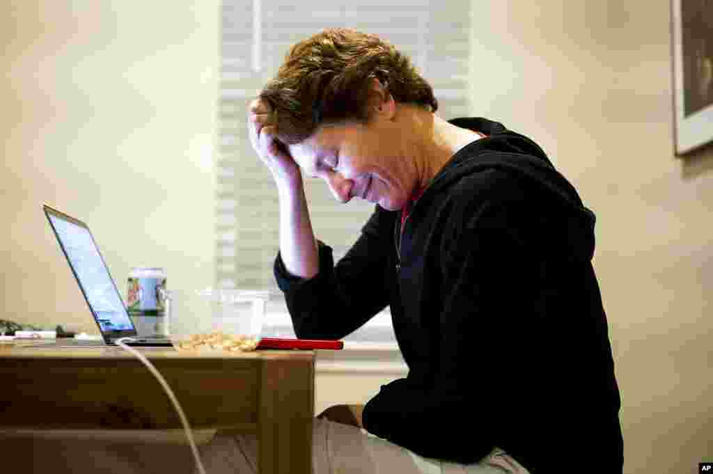 Stanford Professor Carolyn Bertozzi pauses during a phone call shortly after learning she was awarded the Nobel Prize in chemistry, in Palo Alto, California.
