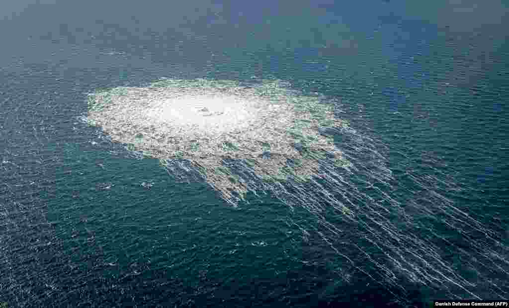 The gas leak at the Nord Stream 2 gas pipeline is seen from the Danish Defence's F-16 rejection response off the Danish Baltic island of Bornholm, south of Dueodde, Denmark. The two Nord Stream gas pipelines linking Russia and Europe have been hit by unexplained leaks, Scandinavian authorities said, raising suspicions of sabotage.