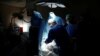 FILE - Doctors treat a patient during a pilot of an Israeli-developed photodynamic therapy to kill prostate cancer tumors in patients, at an operating room in Ramat Aviv Medical Center's Urology department in Tel Aviv, Israel, May 5, 2016.