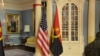 Bandeiras dos Estados Unidos e de Angola
