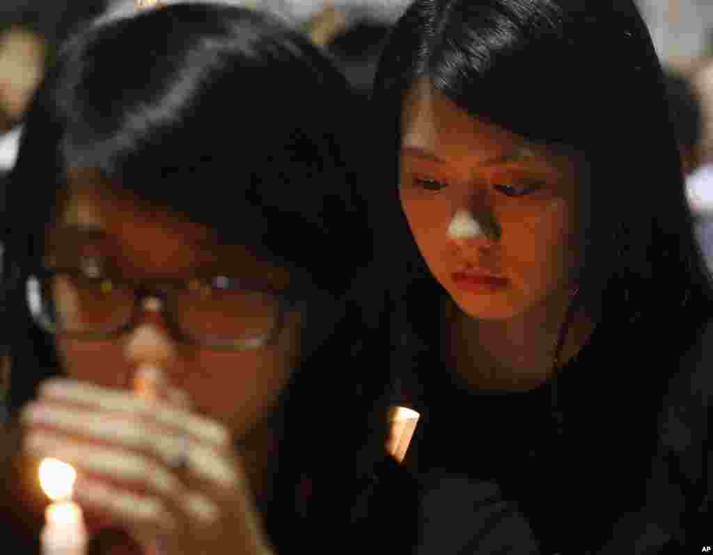 Students attend a candlelight vigil at Hong Kong's Victoria Park in Hong Kong, June 4, 2012, to mark the 23rd anniversary of the Chinese military crackdown on the pro-democracy movement in Beijing.