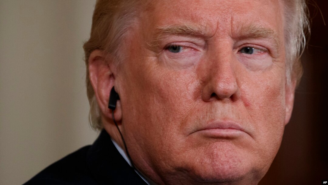 President Donald Trump listens as the Emir of Kuwait, Sheikh Sabah Al-Ahmad Al-Jaber Al-Sabah, speaks during a news conference in the East Room of the White House in Washington, Sept. 7, 2017.