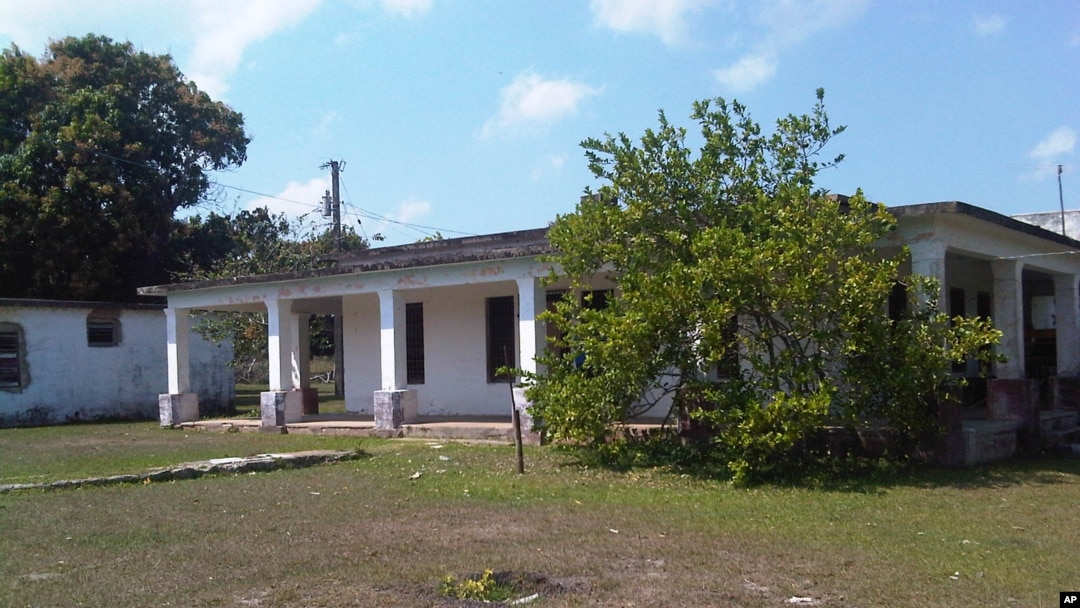 FILE - This March 20, 2015, photo shows a house that used to belong to U.S. citizen Daniel Smith in the Isle of Pines, Cuba. The property was confiscated by the Cuban government after the revolution.
