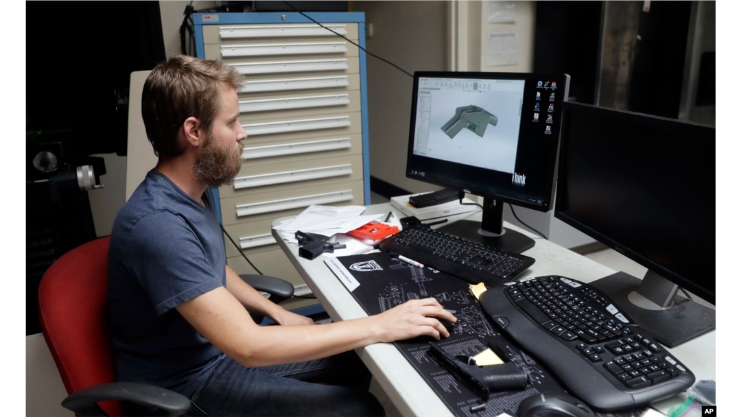 Ben Chalker shows the CAD software of a 3D-printable gun called the Liberator in Austin, Texas, Aug. 1, 2018.