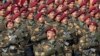 FILE - Indian Special Forces commando G. D. Singh shouts as he leads his battalion during the Republic Day parade in New Delhi.