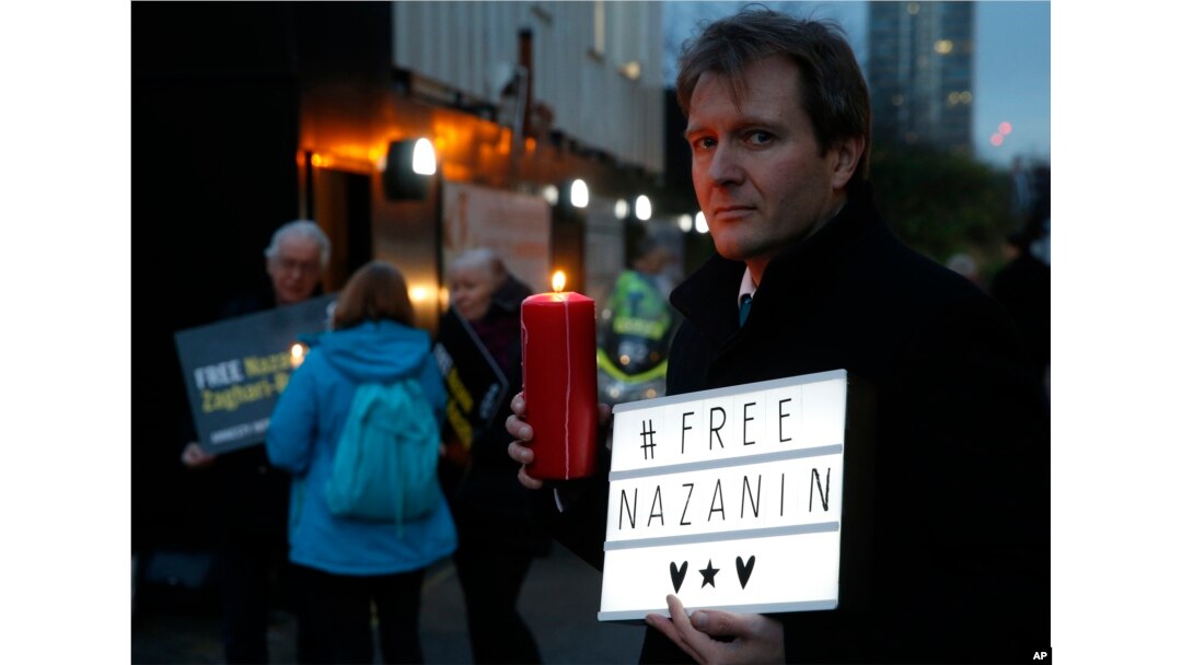 FILE -- Richard Ratcliffe husband of imprisoned charity worker Nazanin Zaghari-Ratcliffe, poses for the media during an Amnesty International led vigil outside the Iranian Embassy in London, Jan. 16, 2017.