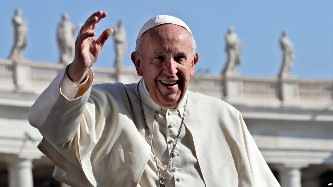 Pope Francis waves as he tours St. Peter's Square ahead of his weekly general audience, at the Vatican, Wednesday, April 12, 2017.