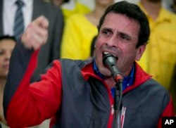Opposition leader Henrique Capriles speaks during a press conference in Caracas, Venezuela, Oct. 21, 2016.