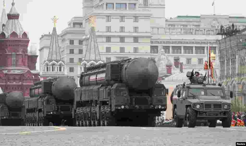 Russian servicemen drive Yars RS-24 intercontinental ballistic missile systems during the Victory Day parade, which marks the anniversary of the victory over Nazi Germany in World War Two, in Red Square in central Moscow, Russia.