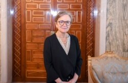 Newly appointed Prime Minister Najla Bouden Romdhane poses for a picture during her meeting with Tunisia's President Kais Saied, in Tunis, Tunisia, Sept. 29, 2021.