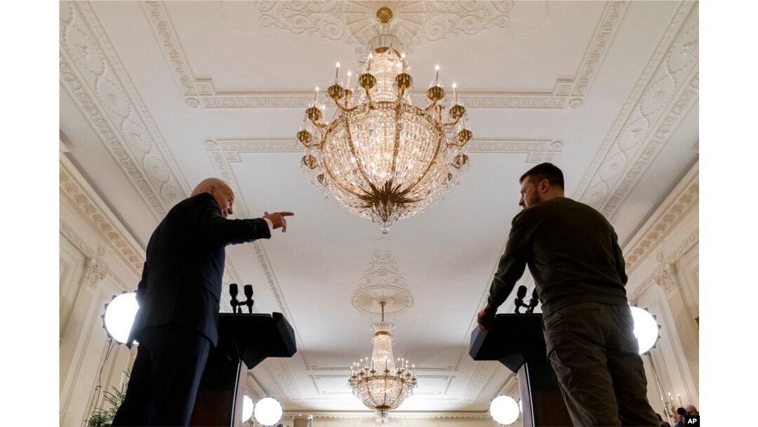FILE - U.S. President Joe Biden speaks during a news conference with Ukrainian President Volodymyr Zelenskyy in Washington on Dec. 21, 2022. Zelenskyy has expressed disappointment that Biden will not be attending the Ukraine Peace Summit in Switzerland June 15-16, 2024.