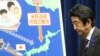 Japanese Prime Minister Shinzo Abe arrives for a press conference at his official residence in Tokyo, July 1, 2014. 