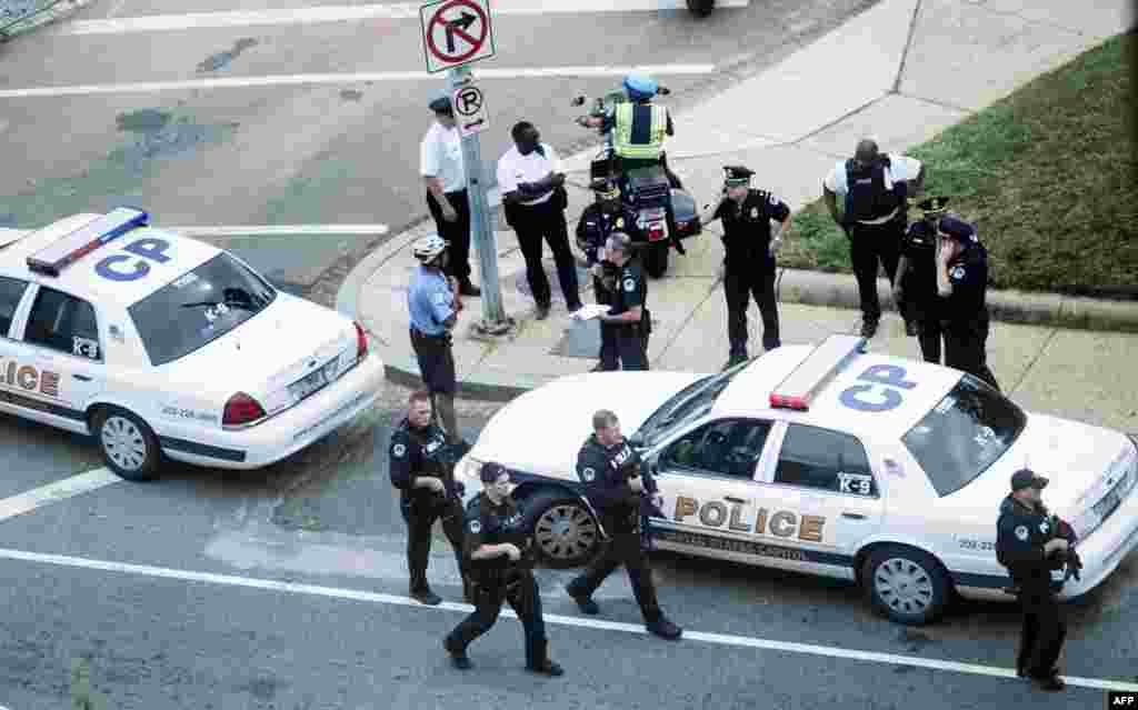 Police react on Capitol Hill after shots fired were reported.