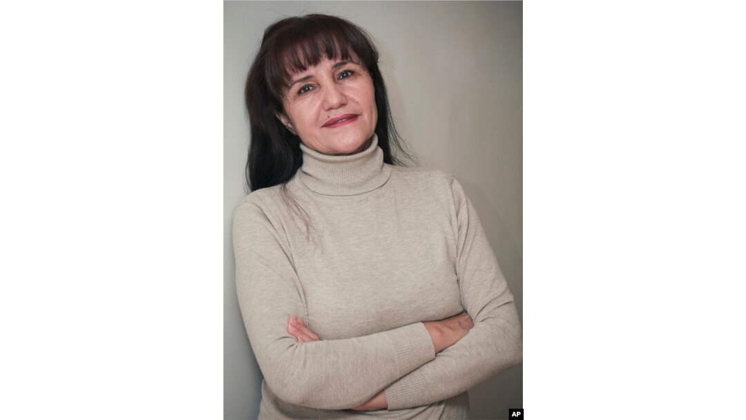 FILE - Uzbek film director Umida Akhmedova, pictured in Tashkent in November 2009, has been accused of slander and "damaging the country's image" for publishing a series of photos about life in rural parts of Uzbekistan.