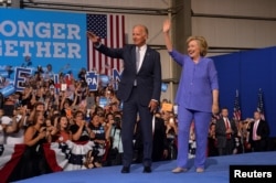 Democratic presidential candidate Hillary Clinton and Vice President Joe Biden campaign together during an event in Scranton, Pa., Aug. 15, 2016.