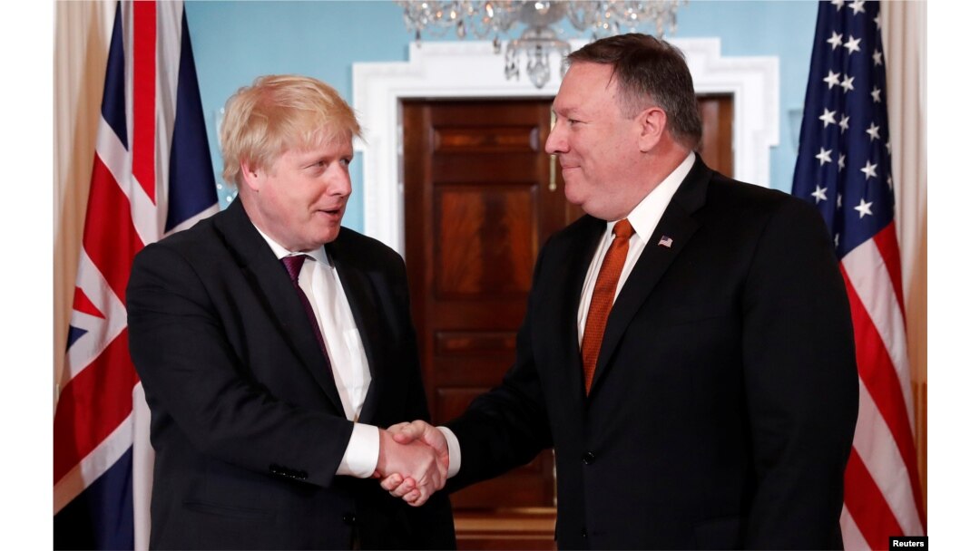 U.S. Secretary of State Mike Pompeo, right, meets with British Foreign Secretary Boris Johnson at the State Department in Washington, May 7, 2018.
