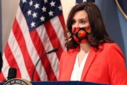 Michigan Gov. Gretchen Whitmer addresses the state on the COVID-19 pandemic during a speech in Lansing on Feb. 24, 2021.