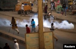 A tear gas canister fired to disperse Sudanese demonstrators, during anti-government protests in the outskirts of Khartoum, Sudan, Jan. 15, 2019.