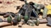 FILE - Ammunition used by suspected al-Shabab assailants killed during an attack is displayed outside Somalia's regional government headquarters in the central city of Baidoa, March 12, 2015. 