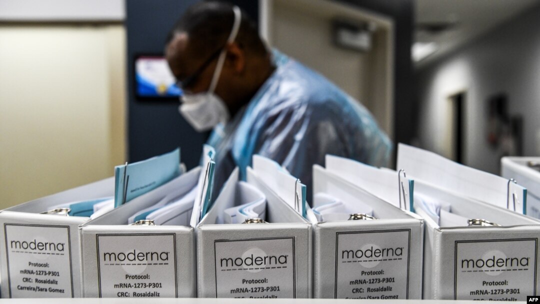 FILE - Biotechnology company Moderna protocol files for COVID-19 vaccinations are kept at the Research Centers of America in Hollywood, Florida, Aug. 13, 2020.