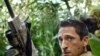 Humans Battle Ferocious Aliens in 'Predators'