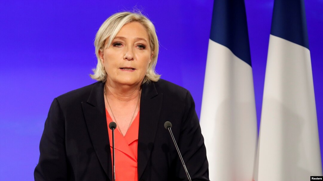 FILE - Marine Le Pen, French National Front (FN) political party candidate for French 2017 presidential election, concedes defeat at the Chalet du Lac in the Bois de Vincennes in Paris after the second round of 2017 presidential election, May 7, 2017.