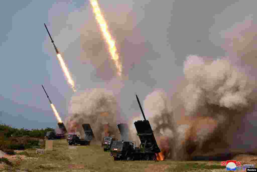 North Korean military conducts a "strike drill" for multiple launchers and tactical guided weapon into the East Sea during a military drill, May 4, 2019, in this photo supplied by the Korean Central News Agency (KCNA).