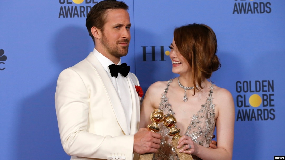 Ryan Gosling and Emma Stone pose with their awards for Best Performance by an Actor in a Motion Picture - Musical or Comedy and Best Performance by an Actress in a Motion Picture - Musical or Comedy for their roles in "La La Land".