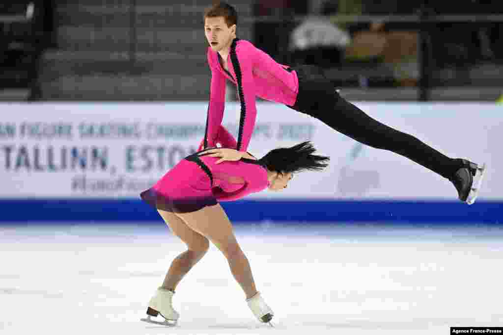 France's Camille Kovalev and Pavel Kovalev perform during the pair's short program of the European Figure Skating Championship 2022 in Tallinn, Estonia.