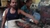 Beef kabab being grilled at a restaurant in a Muslim locality of Kolkata, Sept. 03, 2015. (Shaikh Azizur Rahman/VOA) 