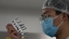 Public Health Experts Urge Caution on China’s COVID-19 Vaccines