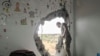 A hole was blown into the children’s room of Wasef Gelani's home during the war, in Tripoli, Libya, June 6, 2020. (Photo courtesy of Wasef Gelani)
