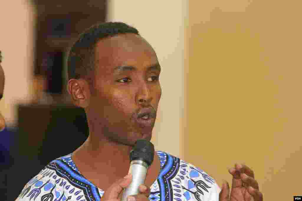 A Somali man asks President Hassan Sheikh Mohamoud a question during Saturday's town hall, in Mogadishu.