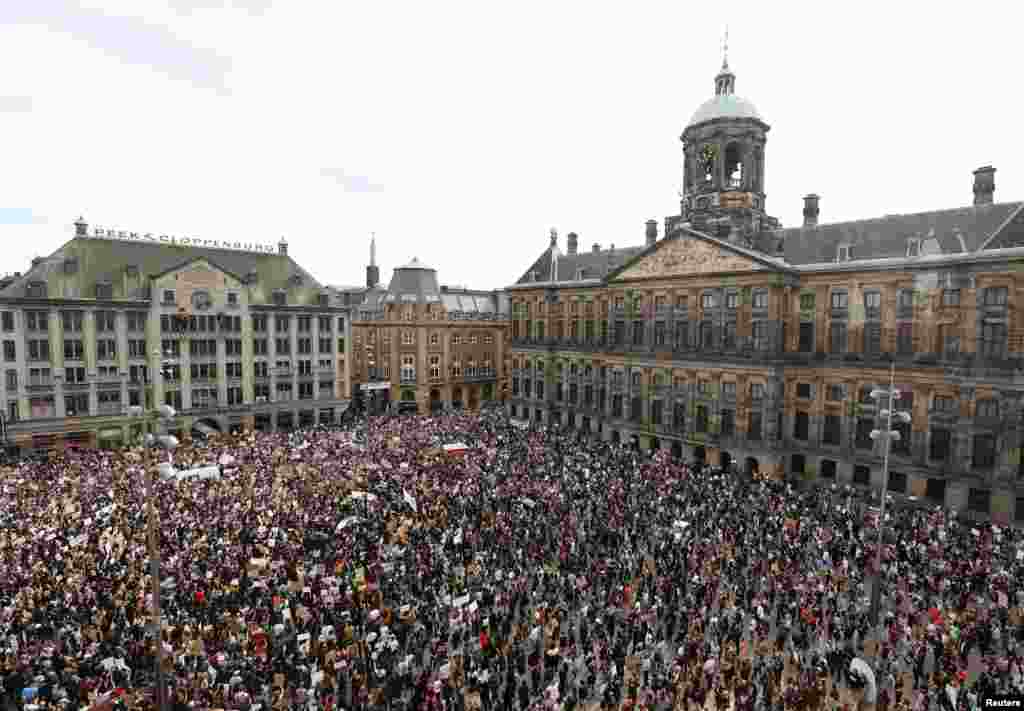 People take part in a protest against the death in Minneapolis police custody of George Floyd, as the spread of the coronavirus disease (COVID-19) continues, in Amsterdam, Netherlands, June 1, 2020.