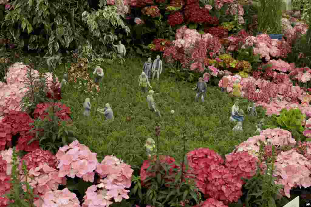 Figurines are displayed as part of the Floella's Future stand at the RHS (Royal Horticultural Society) Chelsea Flower Show in London.