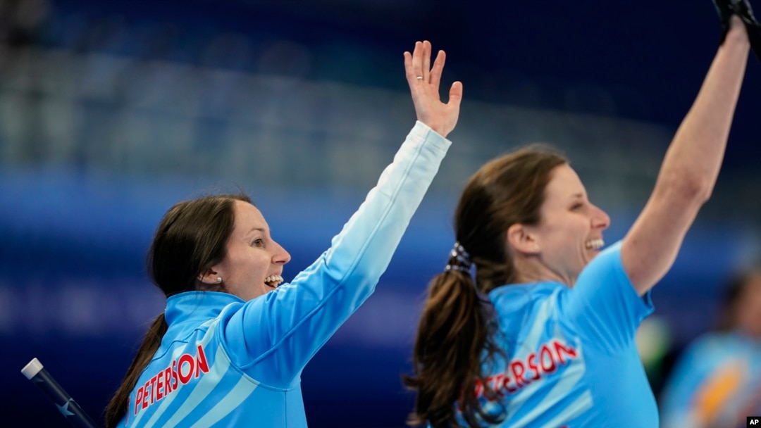 The United State's Tabitha Peterson waves to the crowd after a win against Russian Olympic Committee during a women's curling match at the Beijing Winter Olympics, Feb. 10, 2022, in Beijing. 