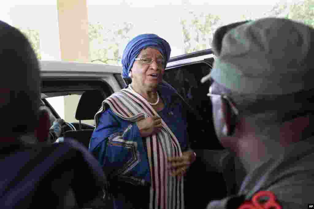 Liberian President Ellen Johnson Sirleaf arrives at the capitol to address lawmakers in Monrovia, Liberia, Sept. 29, 2014.
