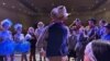 Callum Ganz, 17, center, gives a pre-show pep talk to castmates in 'Crazy for You' on opening night as the Theatre Palisades Youth group returns to the stage after losing their theater in the Palisades fire, in Los Angeles, Feb. 28, 2025.