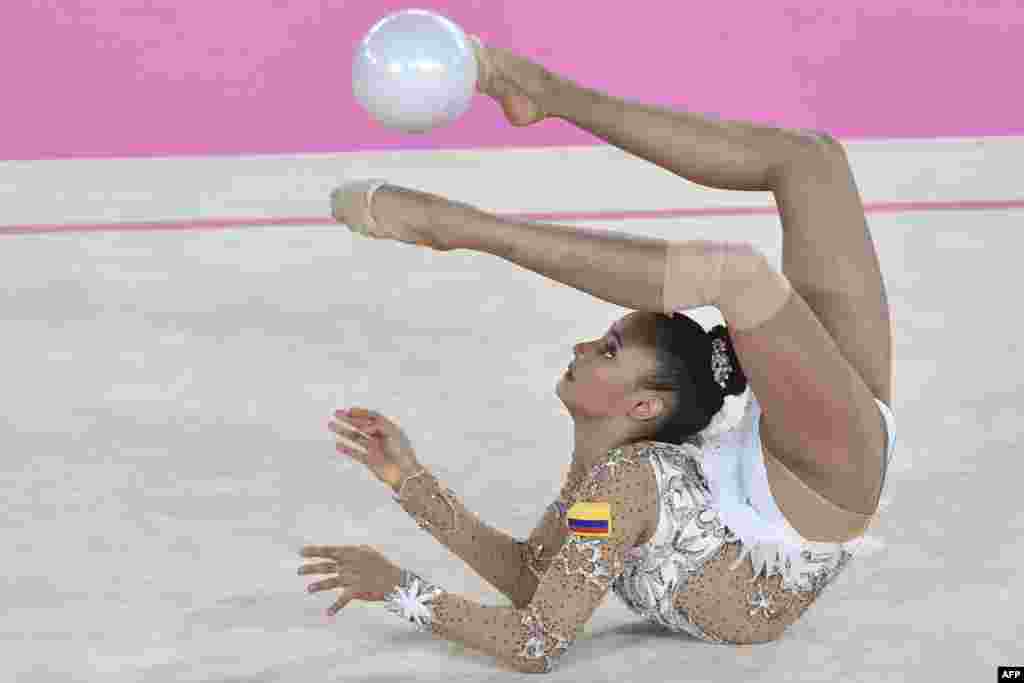 Colombian Oriana Vinas performs in the Individual Rhythmic Gymnastics Ball Finals competition during the Lima 2019 Pan-American Games at the Villa El Salvador Sport Center in Lima, Peru, Aug. 4, 2019.