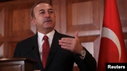 Turkish Foreign Minister Mevlut Cavusoglu speaks during a news conference in Ankara, Turkey, Jan. 14, 2019.