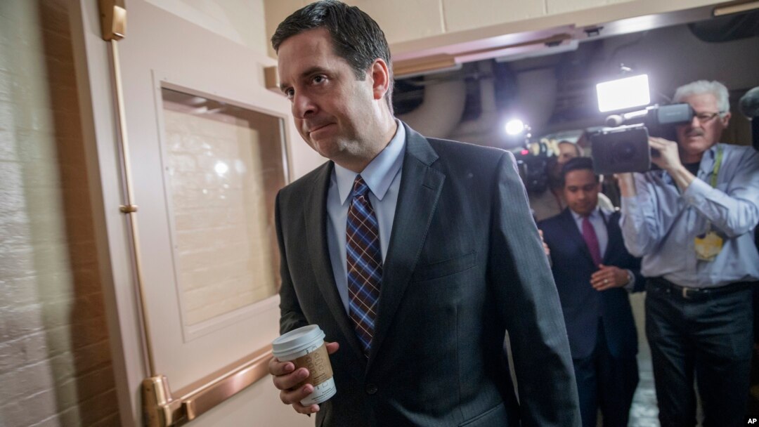 House Intelligence Committee Chairman Rep. Devin Nunes, R-Calif. is pursued by reporters as he arrives for a weekly meeting of the Republican Conference with House Speaker Paul Ryan and the GOP leadership, March 28, 2017, on Capitol Hill in Washington. 