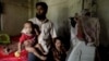 Mohammad Salim, a Rohingya Muslim refugee, with his wife and children, in a village in eastern Indian state of West Bengal. Salim was recently caught by Indian police and jailed after being charged as an illegal immigrant. (Shaikh Azizur Rahman/VOA)