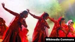 FILE - Performers take part in the Tri-nation Mega Festival: Bangladesh India Pakistan, Dec. 28, 2012.