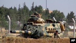 Turkiya tanki Suriya chegarasi yonida